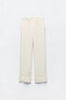 Creased-effect palazzo trousers