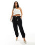 Фото #1 товара River Island Plus jersey cuffed trouser in black