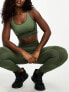 Фото #1 товара Hummel Seamless mesh insert sports crop top in dark green