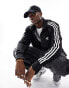 adidas Originals firebird track jacket in black