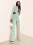 Фото #1 товара ASOS LUXE tailored cut-out flare jumpsuit in green check