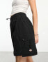 Dickies jackson nylon zip off cargo skirt in black surplus utility pack exclusive to asos