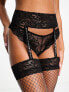 Ann Summers fishnet pull on suspenders set in black