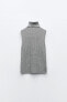 Long buttoned knit vest