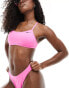 Nike Swimming Essential racerback bikini top in playful pink