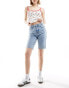 ONLY Emily mid rise raw hem longline denim short in light blue wash