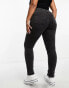 Only Curve skinny jeans in black acid wash