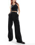 Stradivarius tailored pleat front trousers in black Черный, 32 - фото #1