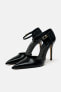 Heeled shoes with ankle strap