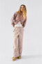 Faded-effect cargo trousers