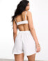 ASOS DESIGN Weekend Collective shorts with woven label in white