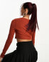 Nike Dance long sleeve crop top in rugged orange