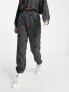 Фото #4 товара ASOS DESIGN co-ord jogger with floral embroidery in washed black