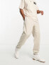 Armani Exchange logo joggers in beige mix and match