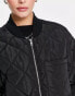 Edited maxi quilted bomber coat in black