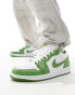 Air Jordan 1 Low trainers in white and green