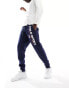 Фото #1 товара Polo Ralph Lauren Sports capsule flag logo cuffed joggers in navy