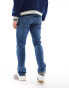 Фото #2 товара Levi's 502 taper fit jeans in mid blue