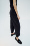 Straight-leg trousers with turn-up hems