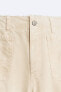 Trousers with utility pockets