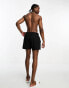 COLLUSION shorter length swim short in black