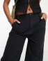 Фото #4 товара ASOS DESIGN Tall oversized cargo trouser with multi pocket in black