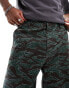 ASOS DESIGN baggy fit chino trouser in camo print