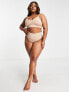 Spanx Curve Seamless Shaping thong in beige