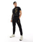 Фото #2 товара Armani Exchange lunar capsule gold embroid dragon logo sweat joggers in black