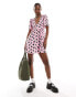 Фото #1 товара Monki short sleeve mini sun dress with v neck in pink and black strawberry print