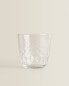 Raised design tumbler