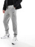 Фото #1 товара Nike Training Dri-FIT tapered joggers in grey