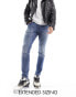 Фото #2 товара ASOS DESIGN skinny jeans with abrasions in mid wash blue