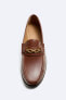 Leather loafers with appliqué