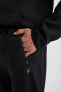 Фото #20 товара Мужские брюки Defacto Fit Slim Fit Esnek Paça Jogger B3529ax23au