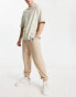 Фото #2 товара ASOS DESIGN oversized joggers in beige brushed rib texture