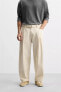 PLEATED TROUSERS WITH BELT