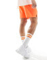 The North Face 24/7 5" logo shorts in orange