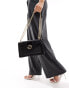 River Island monogram shoulder bag in black