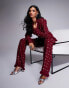 Фото #1 товара ASOS LUXE embellished boucle kick flare trouser co-ord with faux feather hem in Burgundy