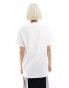 ASOS DESIGN oversized t-shirt with beach bar graphic in white