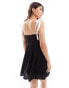 Фото #4 товара Miss Selfridge textured lace babydoll dress with contrast cream tie ribbon straps in black