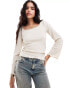 Vila ribbed long sleeve scoop neck top with lettuce edge detail in cream