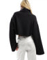 Фото #8 товара Tommy Jeans relaxed cropped badge turtleneck in black