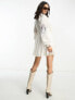 Reclaimed Vintage limited edition mini dress in white with cross stich embroidery