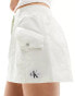 Calvin Klein Jeans bomber mini skirt in white