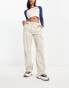 Фото #1 товара Cotton On cargo trousers in ecru