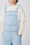 Short dungarees with buckles and label ZARA