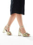 ASOS DESIGN Wide Fit Hitched bow detail mid block heeled sandals in gold