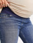 Фото #3 товара ASOS DESIGN Maternity ultimate skinny jeans in authentic mid blue with under the bump waistband